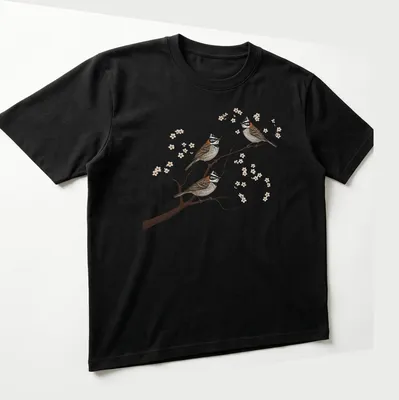 Realistic illustration of three Rufous Collared Sparrows on a branch, detailed and colorful — printed on a unisex t-shirt (angled view)