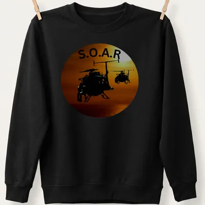 Silhouette of helicopters flying in a sunset with the text S.O.A.R. — printed on a unisex sweatshirt