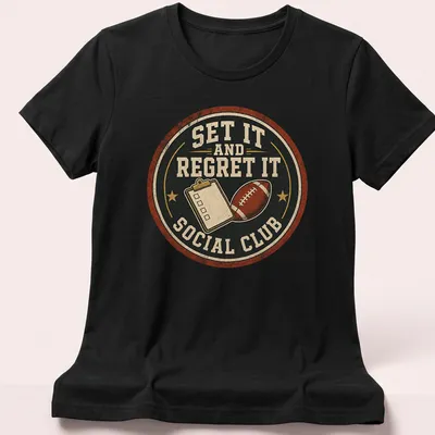 Vintage distressed football-themed t-shirt with humorous text and graphic — printed on a women's shirt