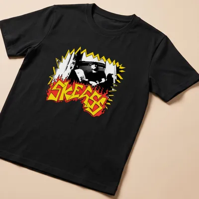 Bold graphic SKEGSS band logo in black, yellow, and red.