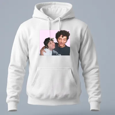 Playful illustration of two friends embracing on a colorful gaming-themed — printed on a unisex hoodie