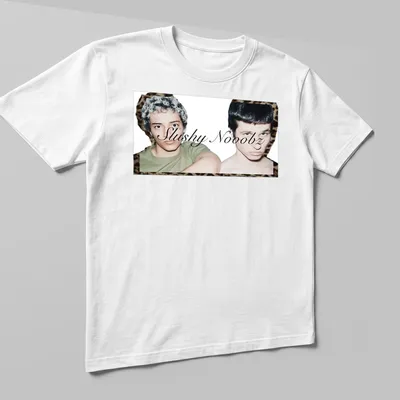 Photographic design depicting two young men with unique hairstyles and the text 'Slushy Nooobz'. — printed on a unisex t-shirt (angled view)