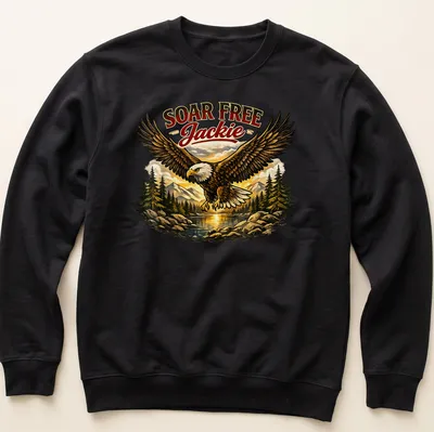 Bald eagle soaring with text 'Soar Free Jackie' in bold lettering — printed on a unisex sweatshirt