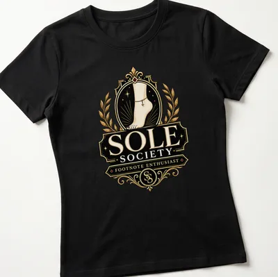 Vintage emblem design featuring a foot with anklet and playful text. — printed on a women's shirt