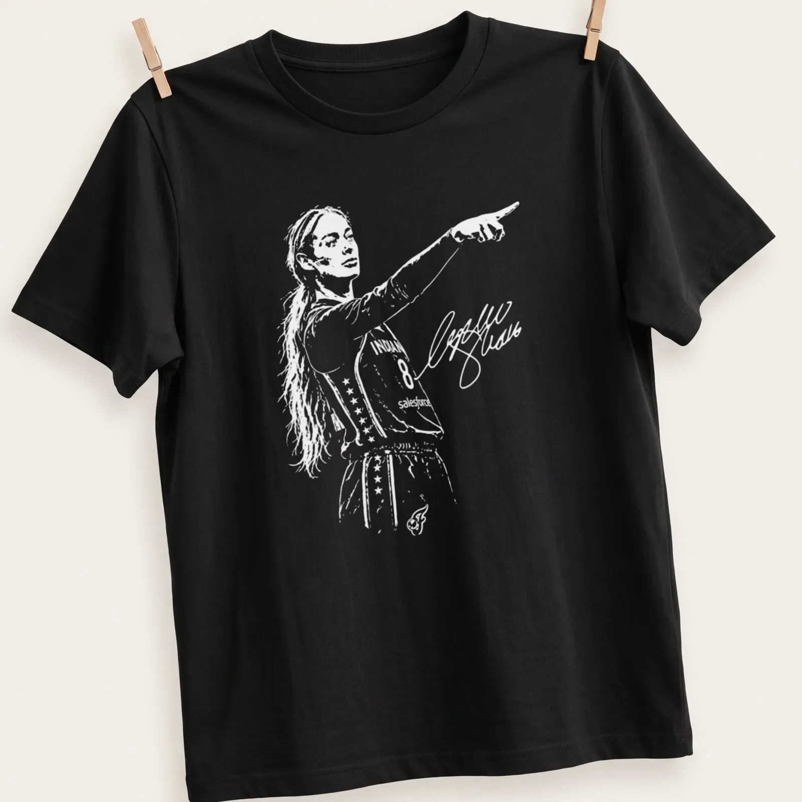 Illustration of a basketball player in action with Sophie Point Signature in bold lettering — printed on a unisex t-shirt