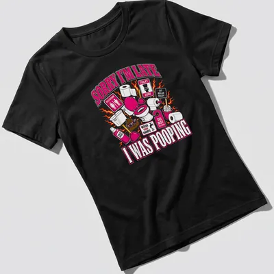 Colorful cartoon shirt with humorous toilet-themed design and text — printed on a women's shirt
