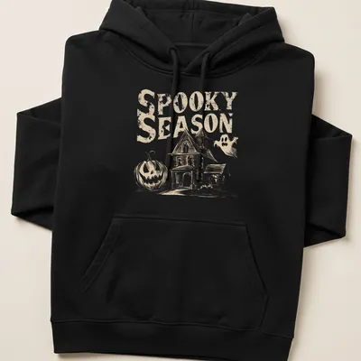 Vintage haunted house, pumpkin, and ghost graphic with text 'Spooky Season' in beige, white, and black. — printed on a unisex hoodie