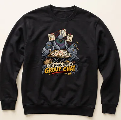 Humorous cartoon pigeons gathered at a table discussing their group chat in colorful tones. — printed on a unisex sweatshirt