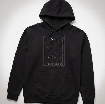 Tarot card style T-shirt featuring a humorous cat design with the text The Catastrophe — printed on a unisex hoodie