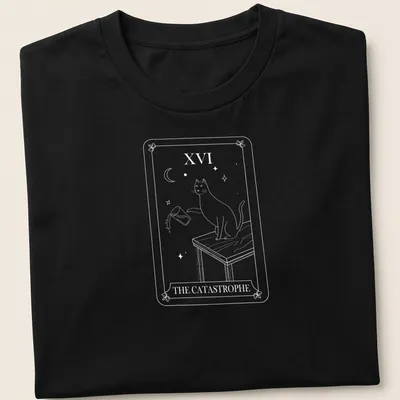 Tarot card style T-shirt featuring a humorous cat design with the text The Catastrophe