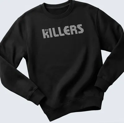 White t-shirt featuring the KILLERS band name in dotted typography — printed on a unisex sweatshirt