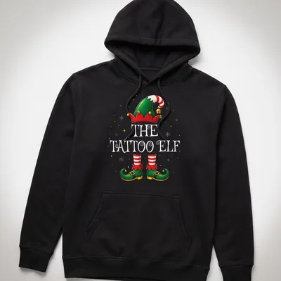 Colorful cartoon of a Christmas elf with tattoos and festive attire — printed on a unisex hoodie