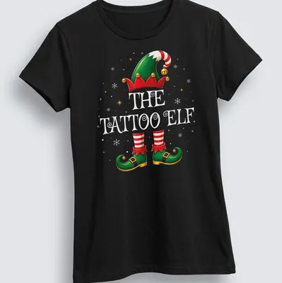 Colorful cartoon of a Christmas elf with tattoos and festive attire — printed on a women's shirt