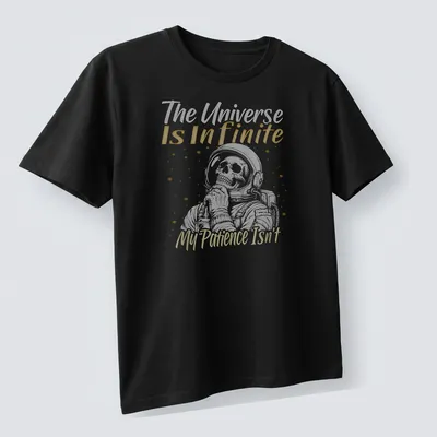 Humorous astronaut skull design with text about patience and the universe in white and yellow — printed on a unisex t-shirt (angled view)