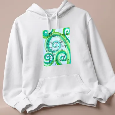 Handwritten motivational phrase on swirling green watercolor patterns — printed on a unisex hoodie