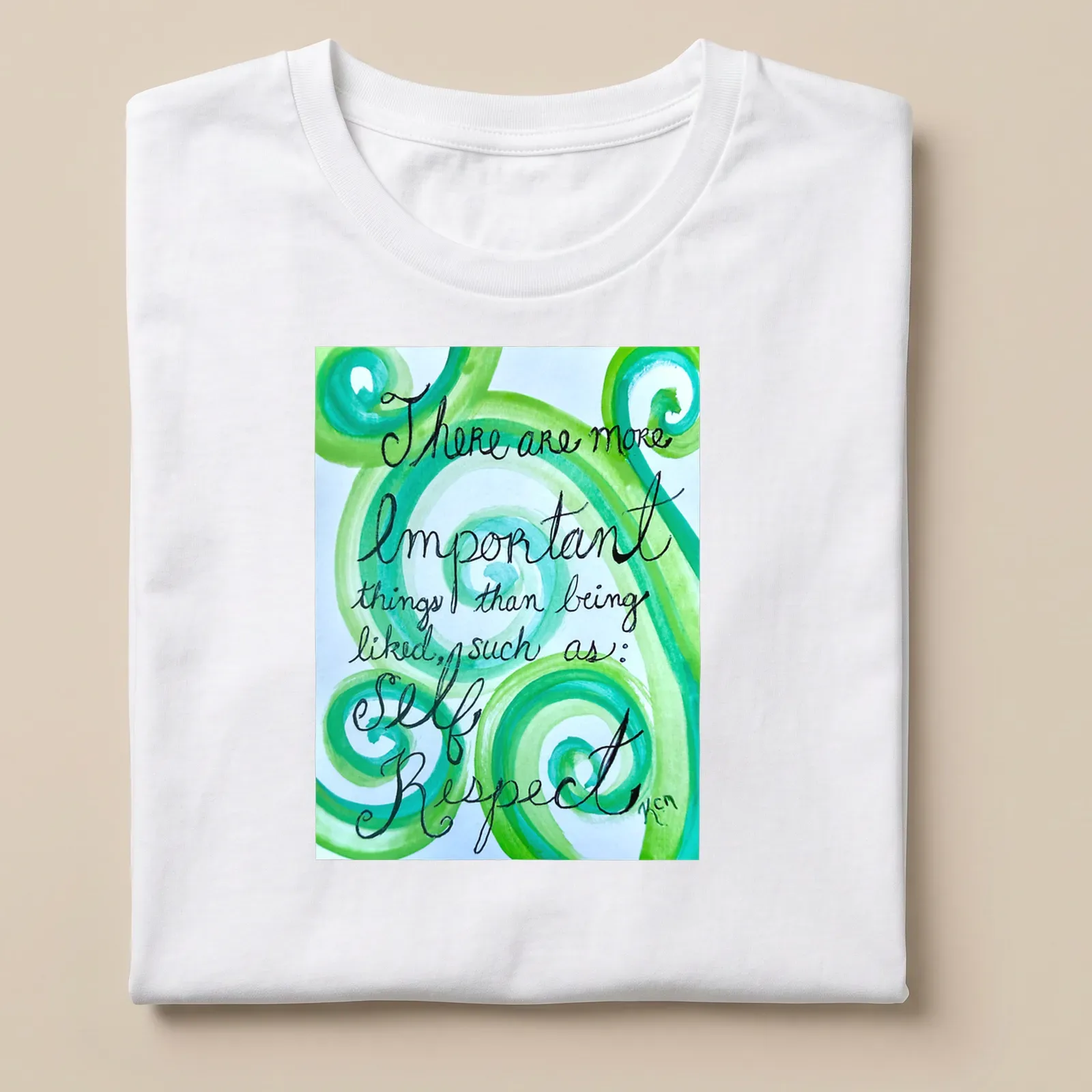 Handwritten motivational phrase on swirling green watercolor patterns — printed on a unisex t-shirt