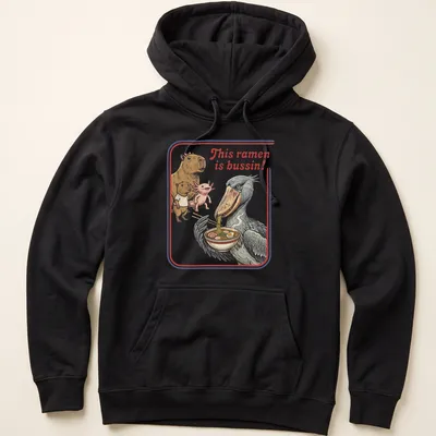 Illustrative t-shirt featuring capybara, axolotl, and shoebill enjoying ramen with vibrant colors — printed on a unisex hoodie
