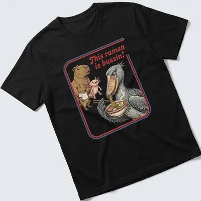 Illustrative t-shirt featuring capybara, axolotl, and shoebill enjoying ramen with vibrant colors