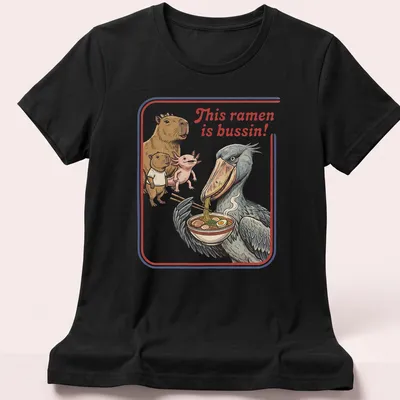 Illustrative t-shirt featuring capybara, axolotl, and shoebill enjoying ramen with vibrant colors — printed on a women's shirt
