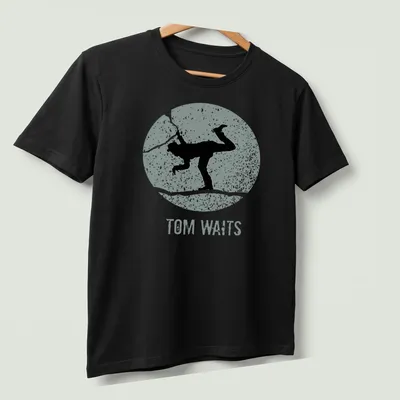 Vintage distressed t-shirt featuring a silhouette of Tom Waits with text — printed on a unisex t-shirt (angled view)