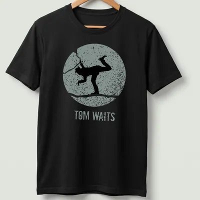 Vintage distressed t-shirt featuring a silhouette of Tom Waits with text