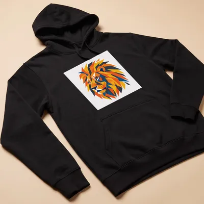 Low poly graphic of a vibrant lion in geometric colors. — printed on a unisex hoodie
