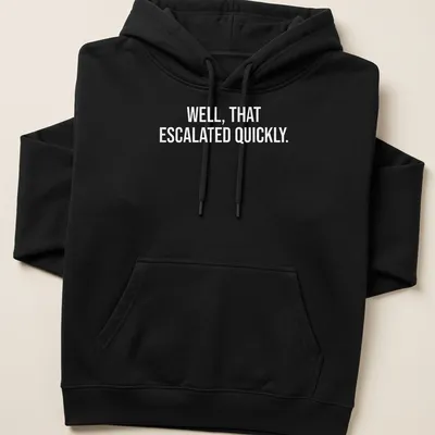 Sarcastic t-shirt with the text 'WELL, THAT ESCALATED QUICKLY.' in bold letters — printed on a unisex hoodie