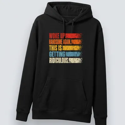 Vintage distressed t-shirt with humorous text about waking up handsome — printed on a unisex hoodie