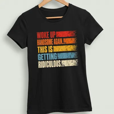 Vintage distressed t-shirt with humorous text about waking up handsome — printed on a women's shirt