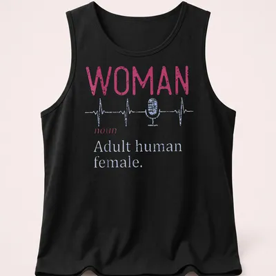 Distressed typography shirt featuring a microphone and heartbeat line with the text 'WOMAN noun Adult human female.' — printed on a tank top