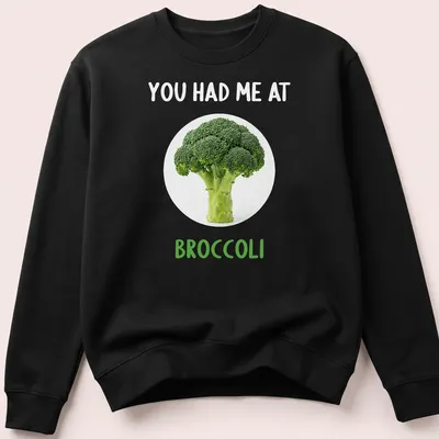 Funny broccoli-themed shirt with playful text in green and white — printed on a unisex sweatshirt