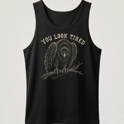 Vintage illustration of a tired vulture with the text 'YOU LOOK TIRED' in brown — printed on a tank top